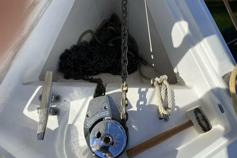 Dolce Vita Yacht Photos Pics Anchor chain and windlass on 2004 Hunter 41 AC sailboat deck.