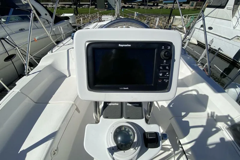 Dolce Vita Yacht Photos Pics Cockpit of 2004 Hunter 41 AC sailboat with Raymarine navigation system.