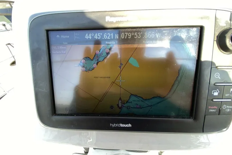 Dolce Vita Yacht Photos Pics Boat navigation system displaying map coordinates on Hunter 41 AC, 2004 model.