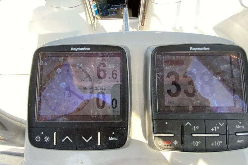 Dolce Vita Yacht Photos Pics Raymarine navigation displays on a 2004 Hunter 41 AC sailboat dashboard.