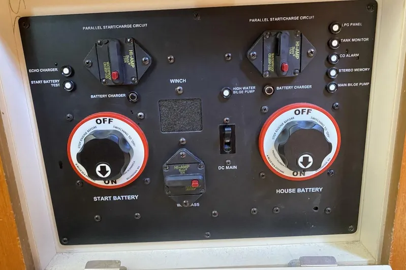 Dolce Vita Yacht Photos Pics Control panel of a 2004 Hunter 41 AC boat, featuring battery switches and circuit controls.