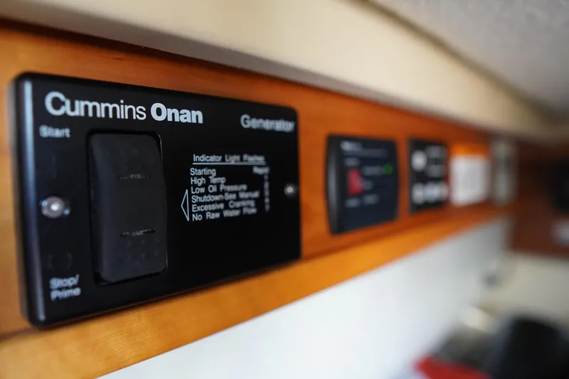 E Ticket Yacht Photos Pics Control panel of a 2015 Cutwater 30 Command Bridge with Cummins Onan generator.