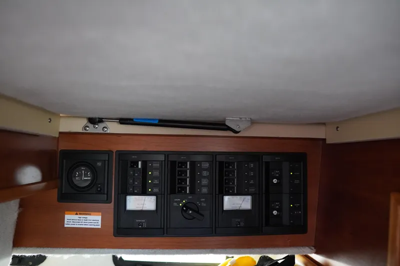 E Ticket Yacht Photos Pics Control panel of 2015 Cutwater 30 Command Bridge boat, featuring various switches and gauges.