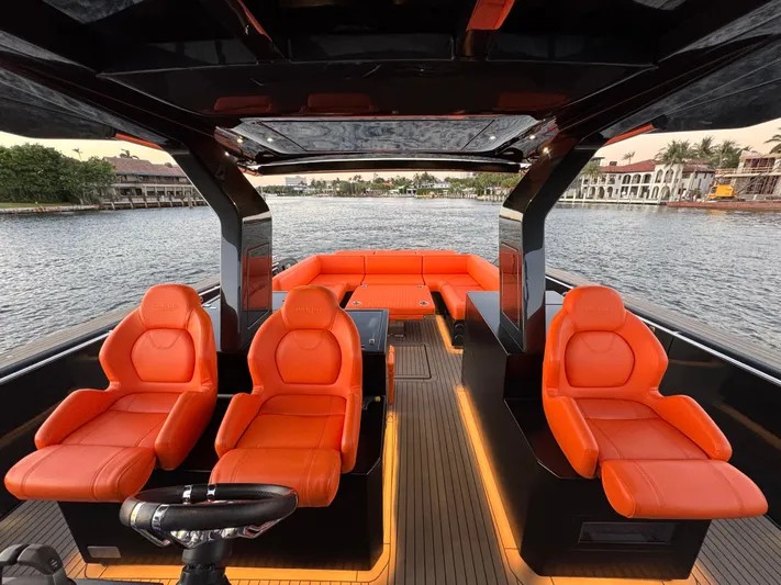 La Doña Yacht Photos Pics Luxurious 2023 Pardo Yachts 50 interior with vibrant orange seating and sleek design.