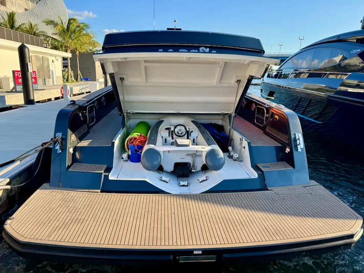 La Doña Yacht Photos Pics 2023 Pardo Yachts 50 with open storage compartment at marina dock.