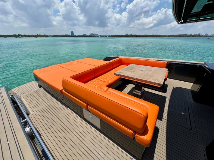 La Doña Yacht Photos Pics Luxury Pardo Yachts 50, 2023 model, featuring vibrant orange seating on deck.