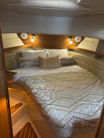  Yacht Photos Pics 2024 Ranger Tugs R31S cabin with cozy bed and ambient lighting.