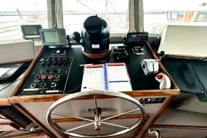 Western Shore Yacht Photos Pics 1989 Custom Expedition boat helm with navigation equipment and steering wheel.