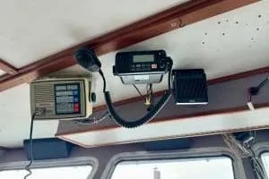 Western Shore Yacht Photos Pics 1989 Custom Expedition boat interior with communication equipment mounted on the ceiling.