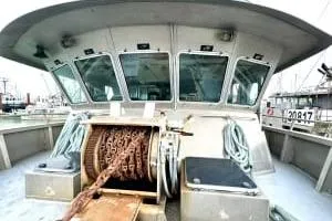 Western Shore Yacht Photos Pics 1989 Custom Expedition boat with winch and ropes on deck, docked at harbor.