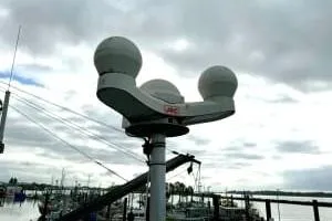 Western Shore Yacht Photos Pics Radar equipment on a Custom Expedition boat, 1989 model, with cloudy sky background.