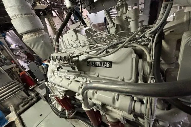 Western Shore Yacht Photos Pics Engine room featuring a Caterpillar engine in a 1989 Custom Expedition vehicle.