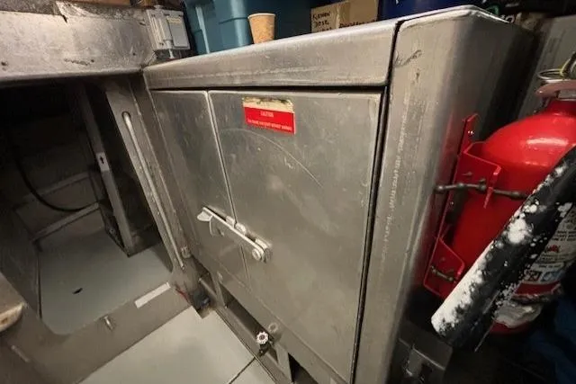 Western Shore Yacht Photos Pics Stainless steel compartment with fire extinguisher, Custom Expedition model, 1989.