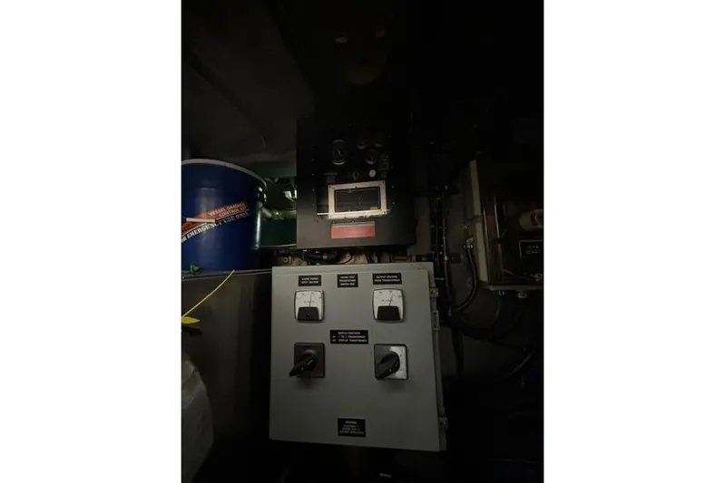 Western Shore Yacht Photos Pics Control panel inside 1989 Custom Expedition vehicle, featuring switches and gauges.