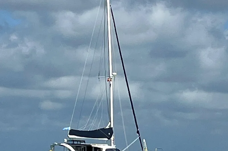 Alacrity Yacht Photos Pics Sailing boat on water under cloudy sky, Fusion 40 model, 2009.