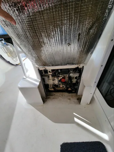 Alacrity Yacht Photos Pics 2009 Fusion 40 engine compartment with insulation panel partially removed.