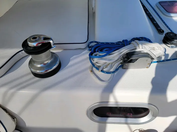 Alacrity Yacht Photos Pics Sailing equipment on 2009 Fusion 40 yacht deck with winch and coiled rope.