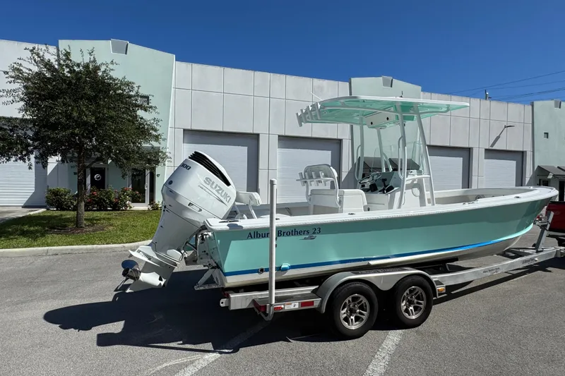  Yacht Photos Pics 2024 Albury Brothers 23 Forward Seating boat on trailer, parked outside building.