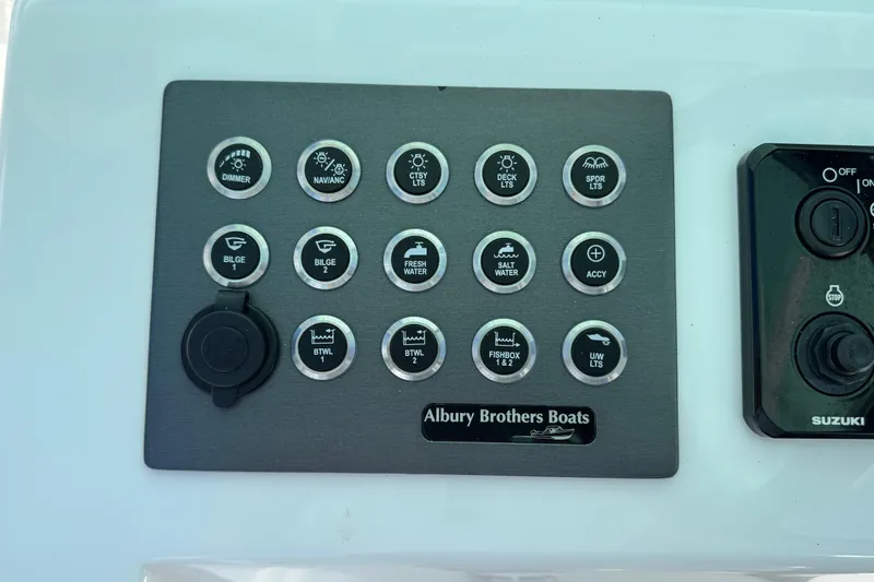  Yacht Photos Pics Control panel of 2024 Albury Brothers 23 Forward Seating boat with labeled buttons.