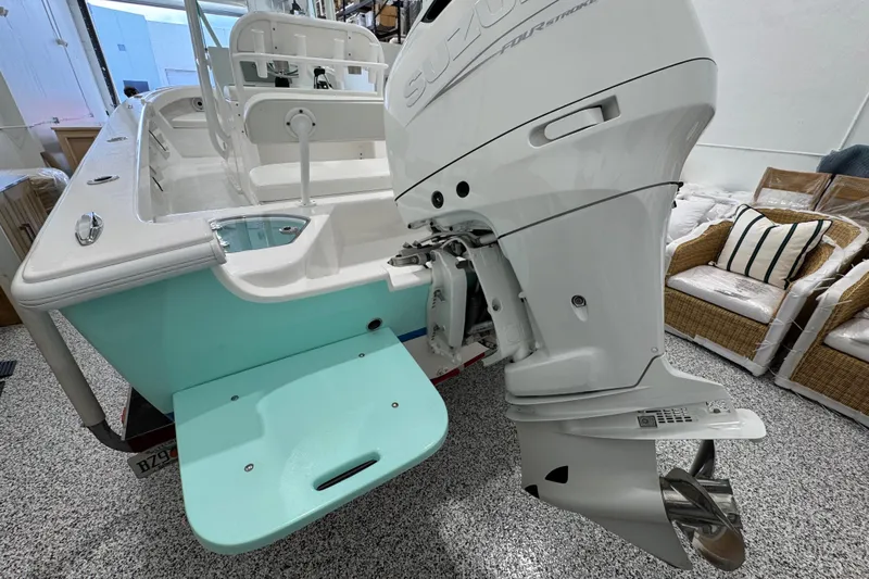  Yacht Photos Pics 2024 Albury Brothers 23 Forward Seating boat with Suzuki outboard motor in showroom.
