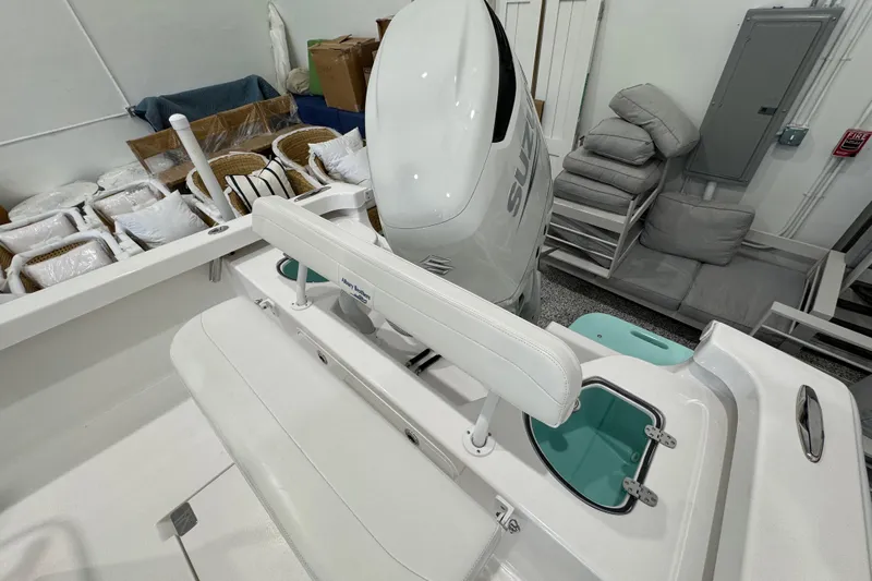  Yacht Photos Pics 2024 Albury Brothers 23 Forward Seating boat interior with Suzuki engine in storage.