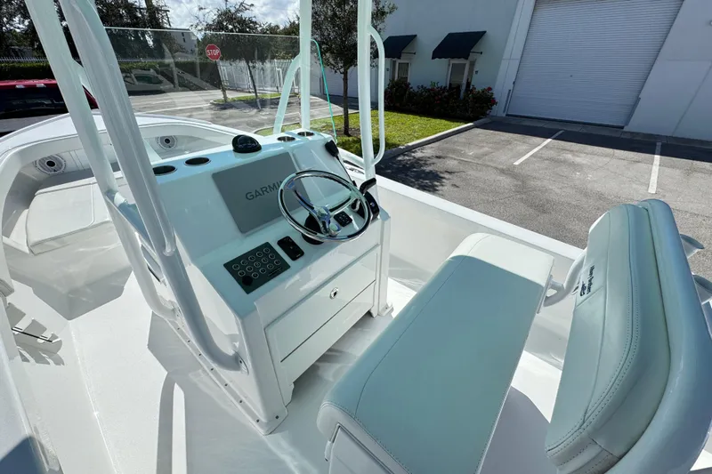  Yacht Photos Pics 2024 Albury Brothers 23 Forward Seating boat interior with Garmin navigation system.