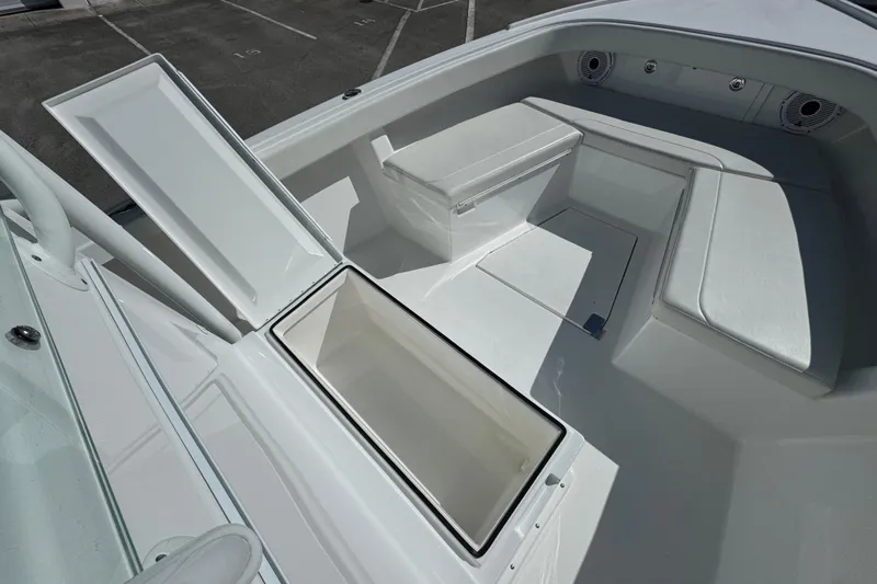  Yacht Photos Pics 2024 Albury Brothers 23 Forward Seating boat interior with open storage compartment.