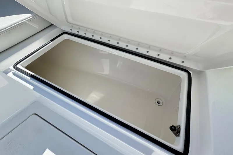  Yacht Photos Pics 2024 Albury Brothers 23 Forward Seating storage compartment, open and empty.