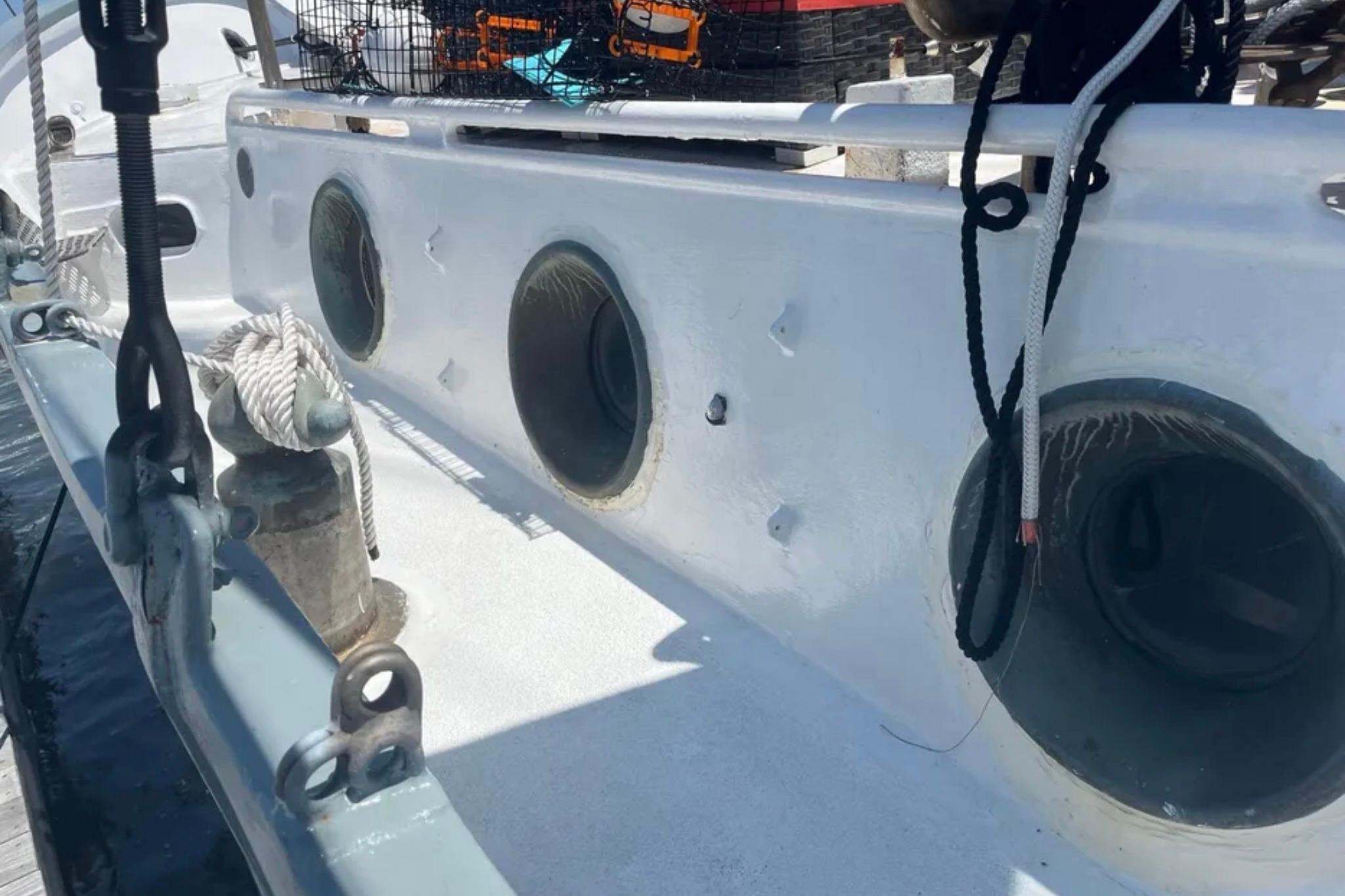 1989 Custom Schooner Liveaboard deck with portholes and ropes, docked at marina.