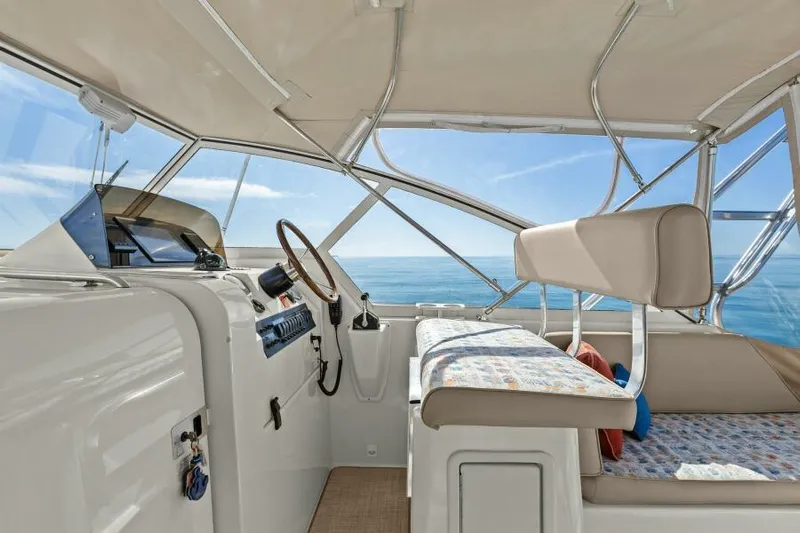 Whattakeeper Yacht Photos Pics Interior of 2006 Mainship 34 Rum Runner II with ocean view.