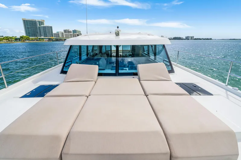  Yacht Photos Pics 2023 Fountaine Pajot MY4.S yacht with sun loungers on deck, ocean view.