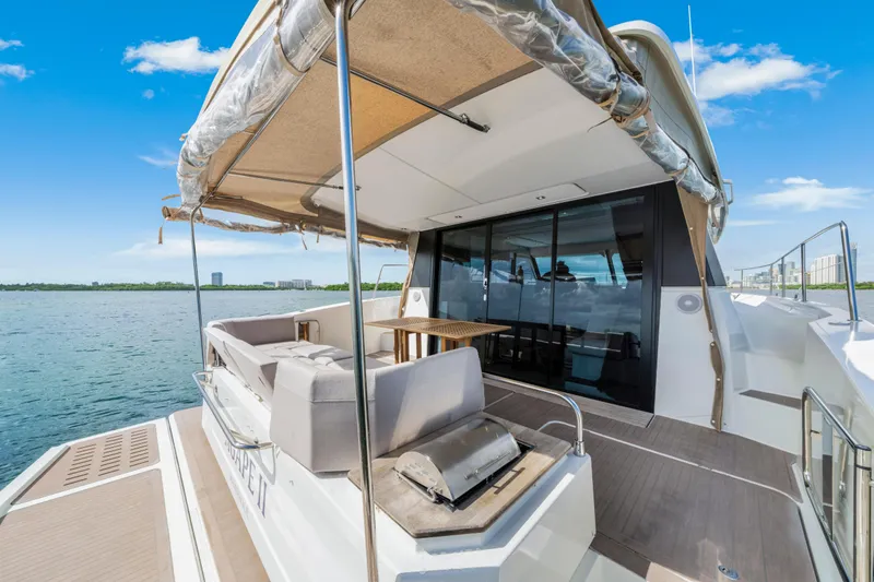  Yacht Photos Pics 2023 Fountaine Pajot MY4.S yacht deck with seating and ocean view.