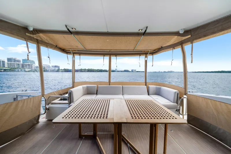  Yacht Photos Pics Luxurious 2023 Fountaine Pajot MY4.S yacht interior with waterfront view.