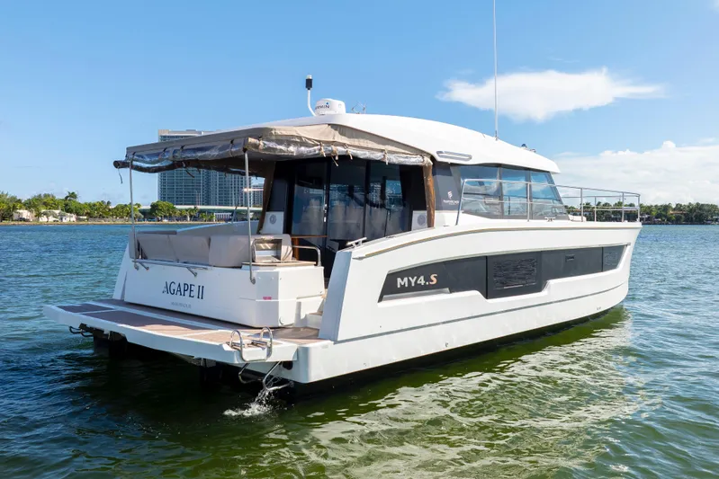  Yacht Photos Pics 2023 Fountaine Pajot MY4.S yacht on water, rear view, sunny day.