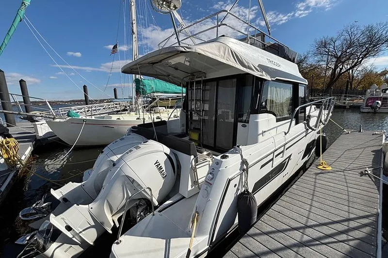  Yacht Photos Pics 2022 Jeanneau NC Weekender 1095 Fly docked with Yamaha engines.