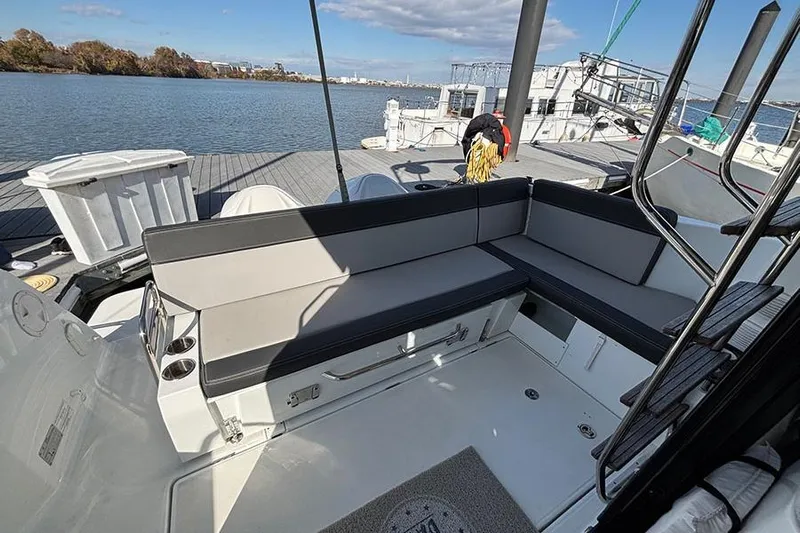  Yacht Photos Pics 2022 Jeanneau NC Weekender 1095 Fly boat with spacious deck seating.