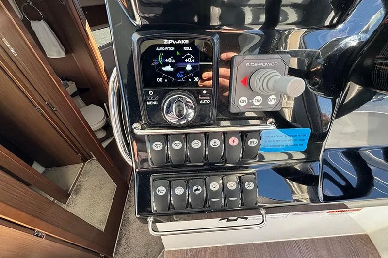  Yacht Photos Pics Control panel of 2022 Jeanneau NC Weekender 1095 Fly boat with Zipwake system.