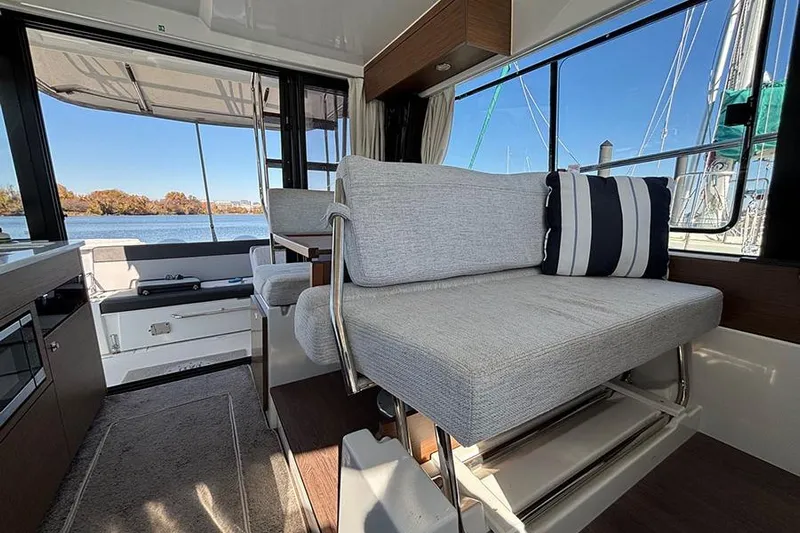  Yacht Photos Pics Interior of 2022 Jeanneau NC Weekender 1095 Fly with seating and scenic view.