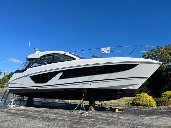  Yacht Photos Pics 2025 Beneteau Gran Turismo 41 yacht on display under clear blue sky.