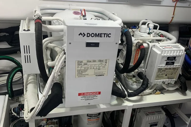 Fluid Power Yacht Photos Pics Engine room of 2019 Viking 44 Sport Coupe with Dometic equipment and wiring.