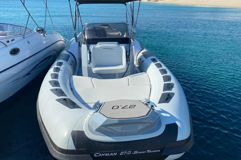  Yacht Photos Pics 2022 Ranieri CAYMAN 27.0 SPORT TOURING boat on clear blue water.