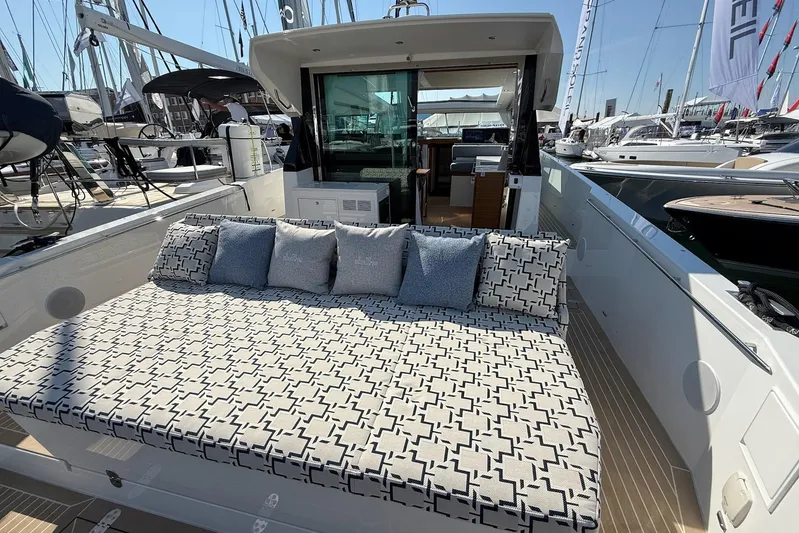  Yacht Photos Pics Luxurious 2026 Delta Powerboats 48 Coupe with stylish outdoor seating and modern design.