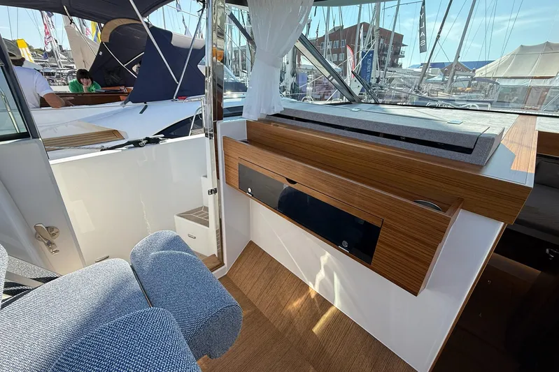 Yacht Photos Pics Interior of 2026 Delta Powerboats 48 Coupe, showcasing sleek wood finish and modern design.
