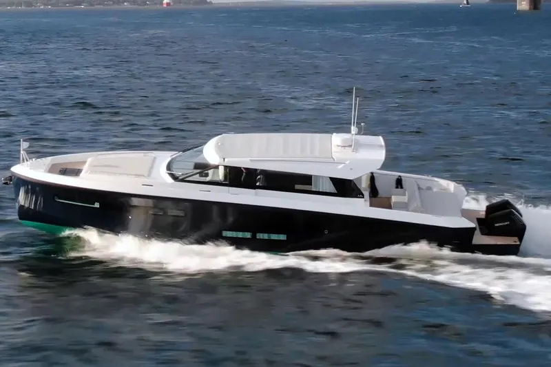  Yacht Photos Pics 2026 Delta Powerboats 48 Coupe cruising on open water.