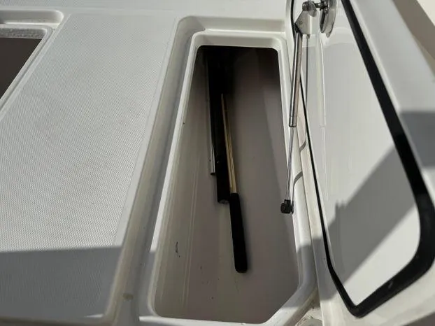 Killin Time II Yacht Photos Pics Storage compartment on a 2015 Invincible 39 Open Fisherman boat.