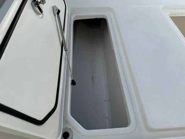 Killin Time II Yacht Photos Pics 2015 Invincible 39 Open Fisherman storage compartment with open hatch.
