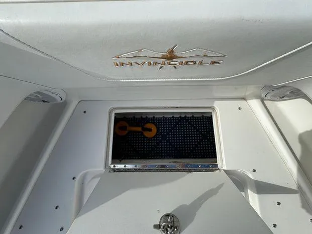 Killin Time II Yacht Photos Pics 2015 Invincible 39 Open Fisherman boat interior with storage compartment.