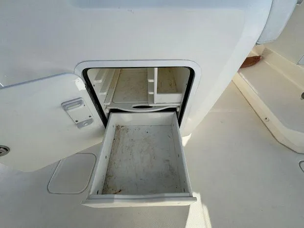 Killin Time II Yacht Photos Pics Open storage compartment on 2015 Invincible 39 Open Fisherman boat.