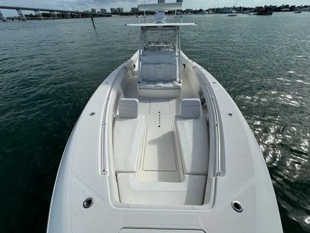 Killin Time II Yacht Photos Pics 2015 Invincible 39 Open Fisherman boat on water, showcasing spacious deck and seating.