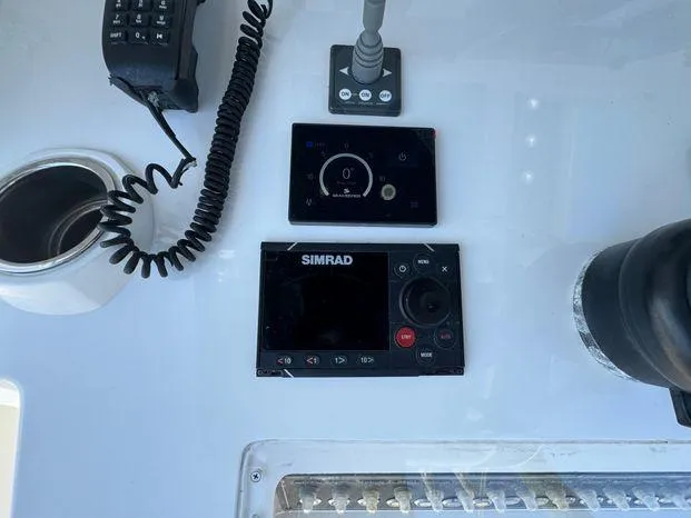 Killin Time II Yacht Photos Pics Control panel of 2015 Invincible 39 Open Fisherman with Simrad navigation system.